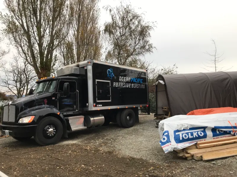 Falcon Heights Oceanfront Industrial Farmhouse - abrasive blasting truck